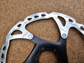 2x kotouče SHIMANO XT SM-RT76 - 180mm - 6 děr/CL - 4