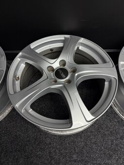 Alu OXXO 5x105 17” - 4