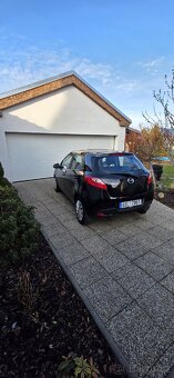 Mazda 2,1,3 63 kw - 4