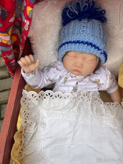 Panenka s kolebkou - 4