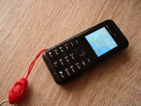 Miniaturní mobil na /3 SIM + paměť.kartu/. - 4