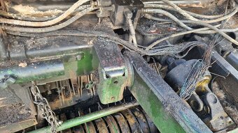 Prodám zbytky lisu John Deere 592 - 4