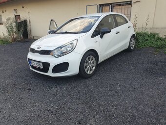 Kia rio - 4