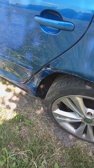 Octavia combi RS - bouraná levá zadní náprava - 4