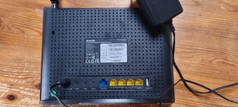 Router Tenda - 4