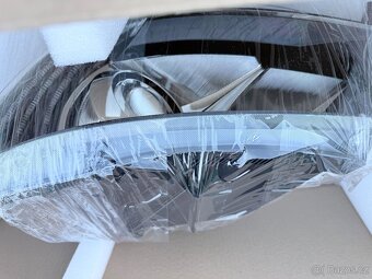 Světlomet HELLA 1ZS 011 314-331 - Škoda Superb 2 - 4