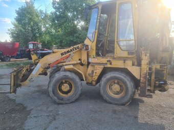 Traktorbagr Komatsu WB60A - 4