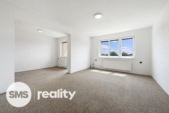 Prodej prostorného řadového domu 4+1 s garáží a zahradou – Č - 4