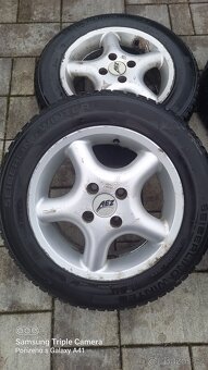 Alu kola a zimní pneu 14" - 4