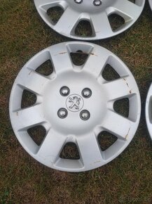 Sada 4 kusů poklic Peugeot (16") - 4