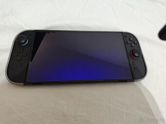 Nintendo Switch 2, zánovní + kryty, pouzdro, tvrzené sklo - 4