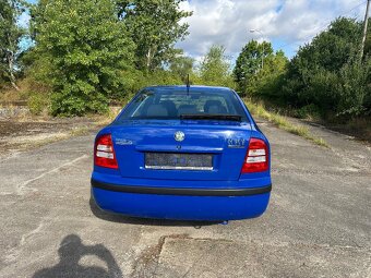 Škoda Octavia 1,6i 75kw výbava TOUR - 4