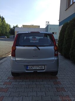 Daihatsu Cuore VII (L275) 1.0 - 4