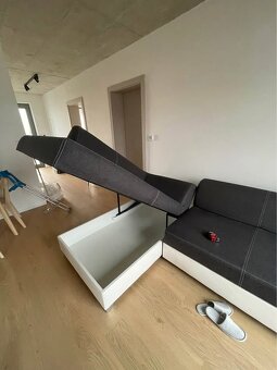 Rohová sedačka/pohovka s úložným prostorem a rozkladem na lů - 4