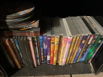 Tři boxy dětských DVD: Peppa Pig, Harry Potter, Disney, Arab - 4