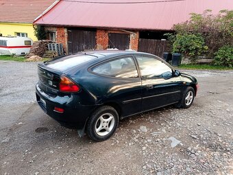 Mazda 323 C - 4