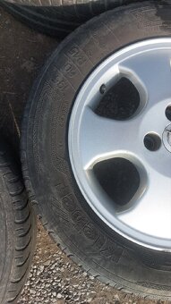 Opel alu ET 49 4x100 R15 sada ALU - pěkné zachovalé OK - 4