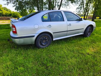 Škoda octavia 1.6 75 kw - 4
