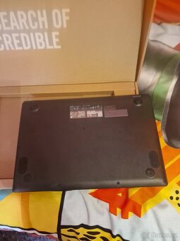 Asus E410 - 4