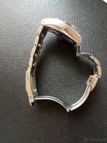 Náramkové hodinky Swatch AG 2004 - 4