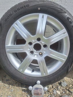 4x ALU 6.5Jx16H2 ET50 SEAT + Pneu 205/55 R16 91W - 4