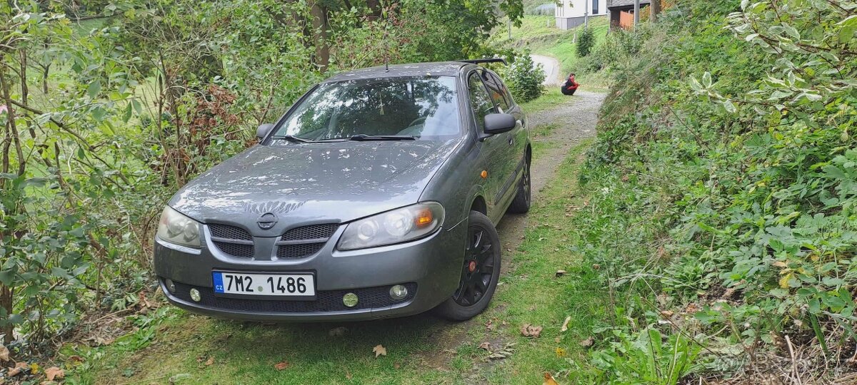 Nissan almera 1,5 - 5