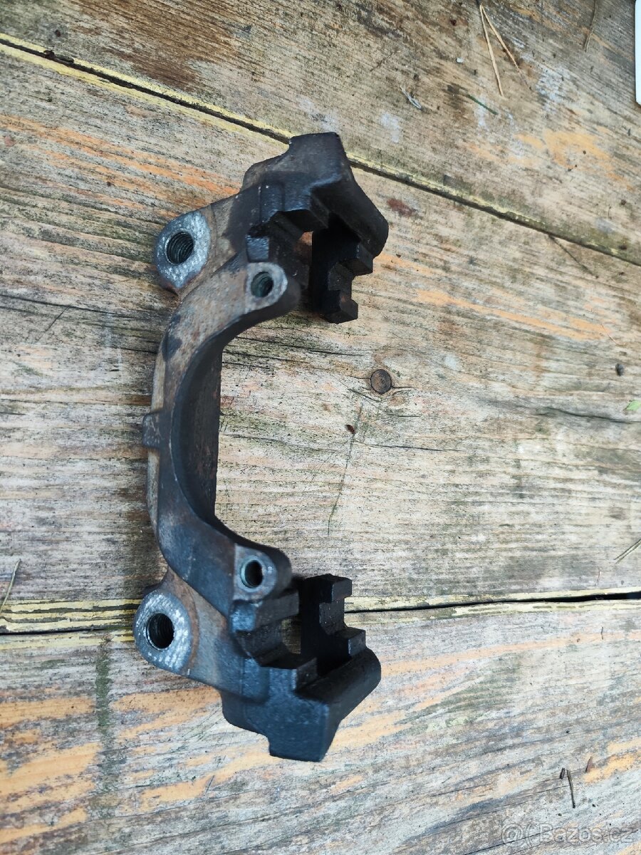 Přední držák brzd. třmene - audi a4 B7 - 5