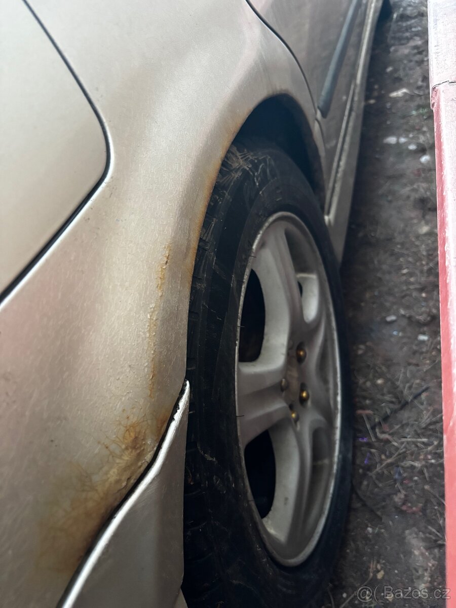 Subaru legacy 2.5 - 5