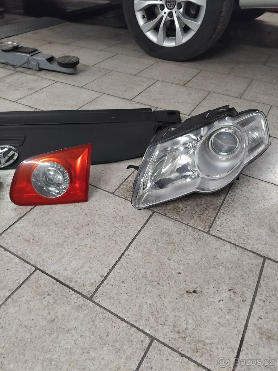 Vw B6 světla, roleta kufru,maska. - 5