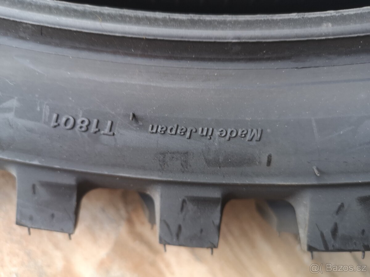 Bridgestone 100/90 R19, nepoužitý zadní drapák.