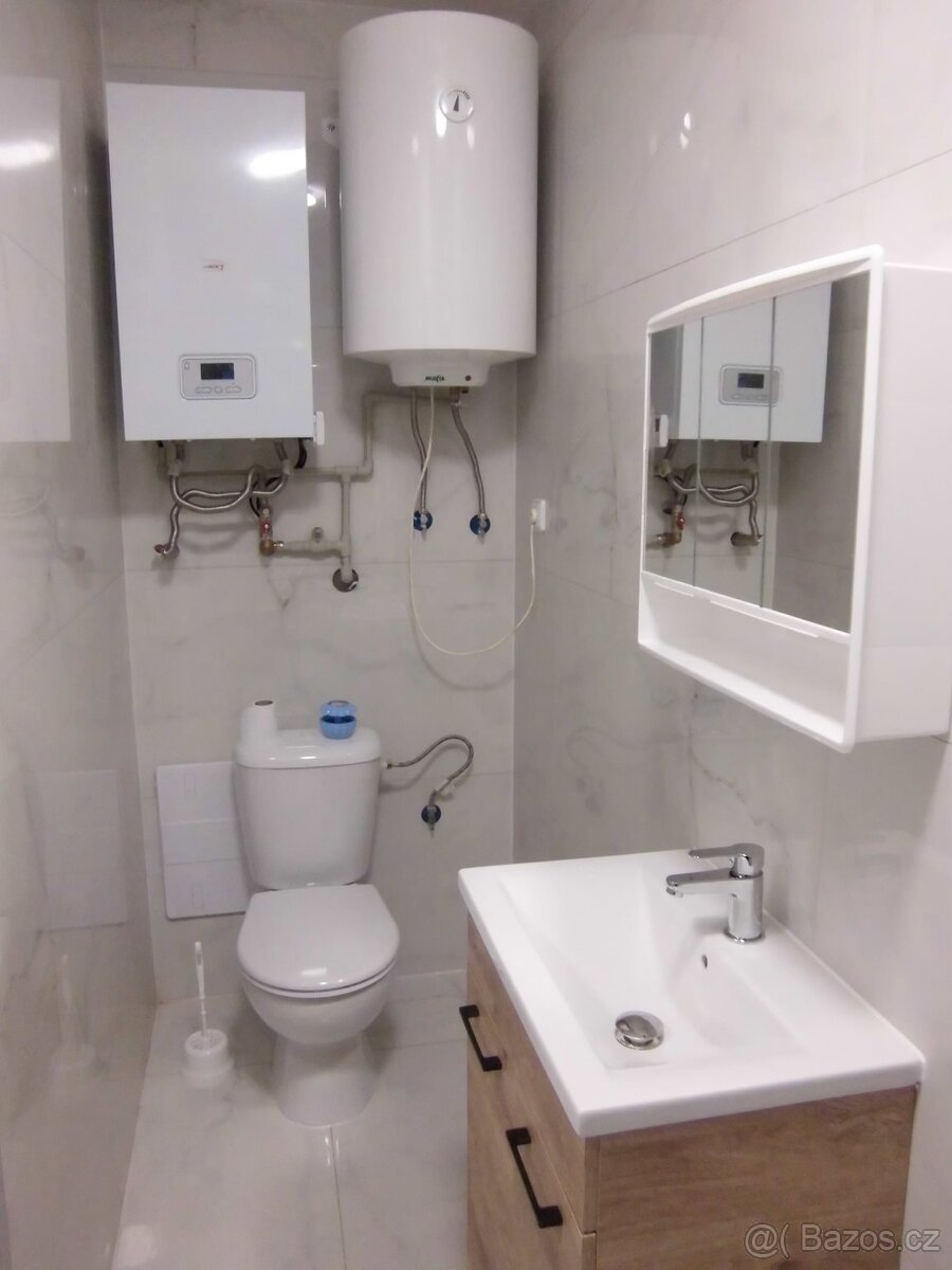 Byt 2+1+hala v rod.domku s terasou a zahrádkou, K.Hora - 5