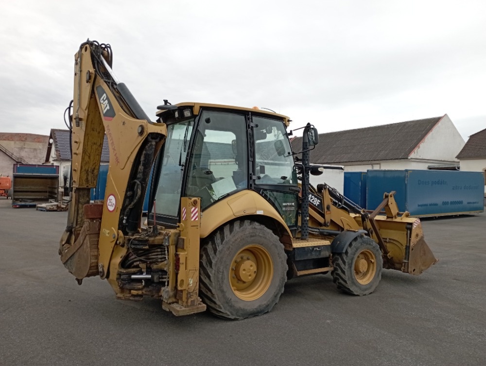 Prodám Caterpillar 428F - 5