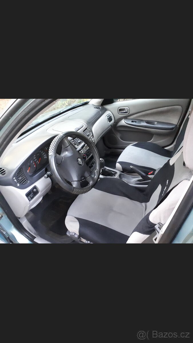 Nissan Almera 1.5 i - 5