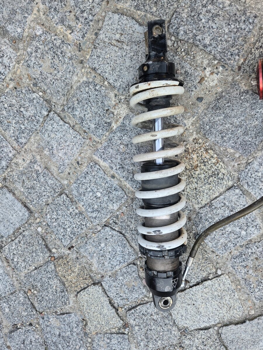 Zadní tlumič Husqvarna 125