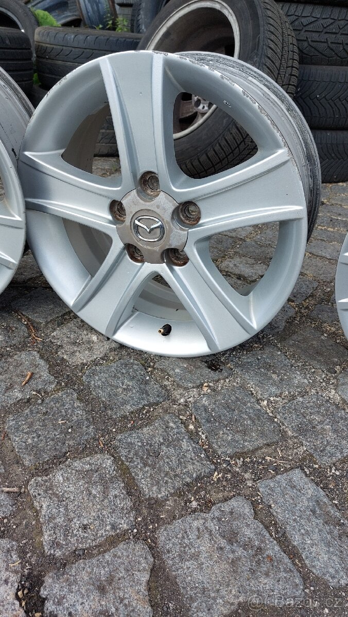 16" SADA ALU DISKŮ MAZDA 7JX16 ET55 - 5