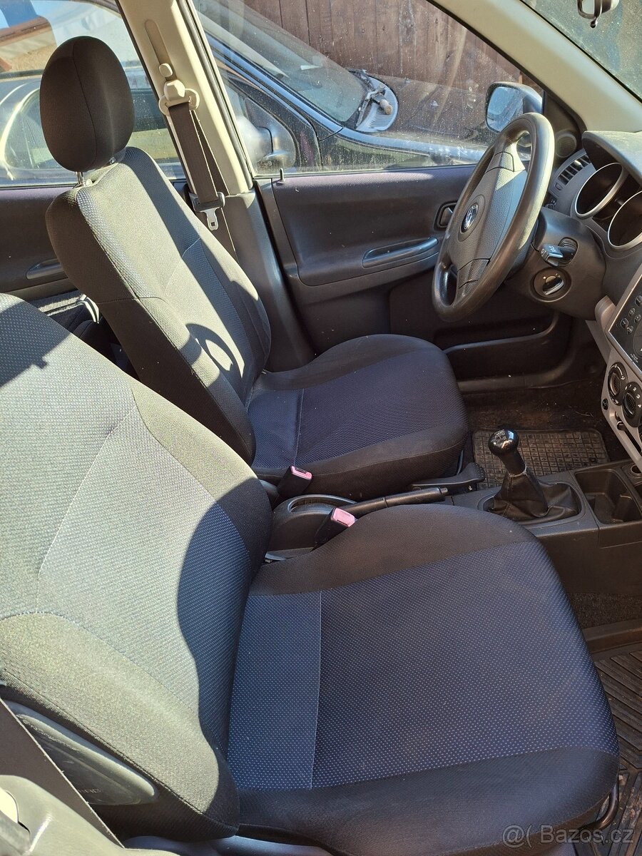 Subaru justy 1,3 4x4 2005 - 5