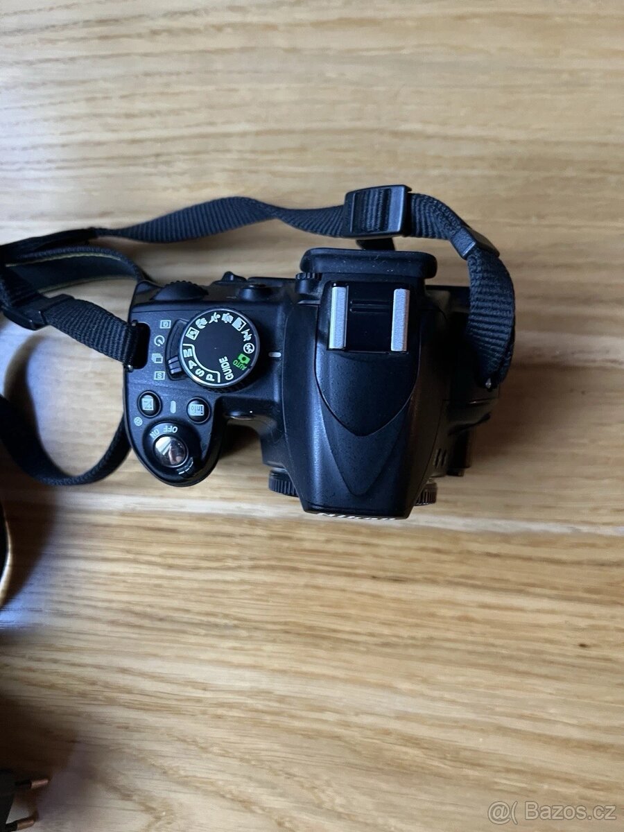 Nikon D3100 tělo a doplňky - 5