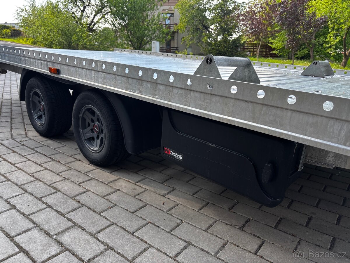 Gromex L4.6m 2700kg alu kola top stav