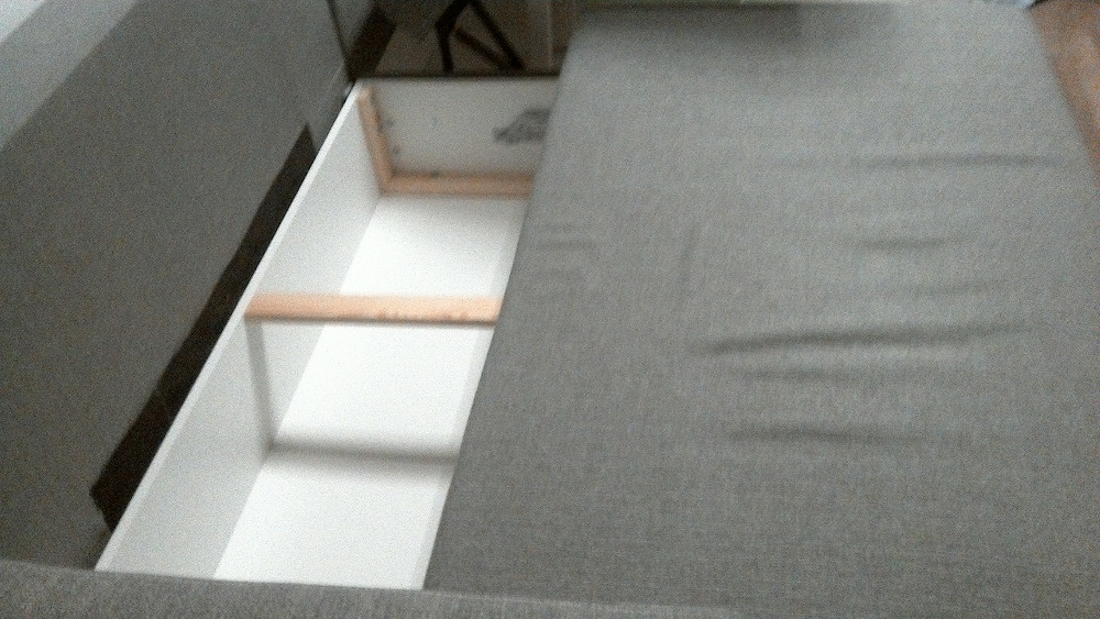 Rohová rozkládací sedačka s úložným prostorem - 5