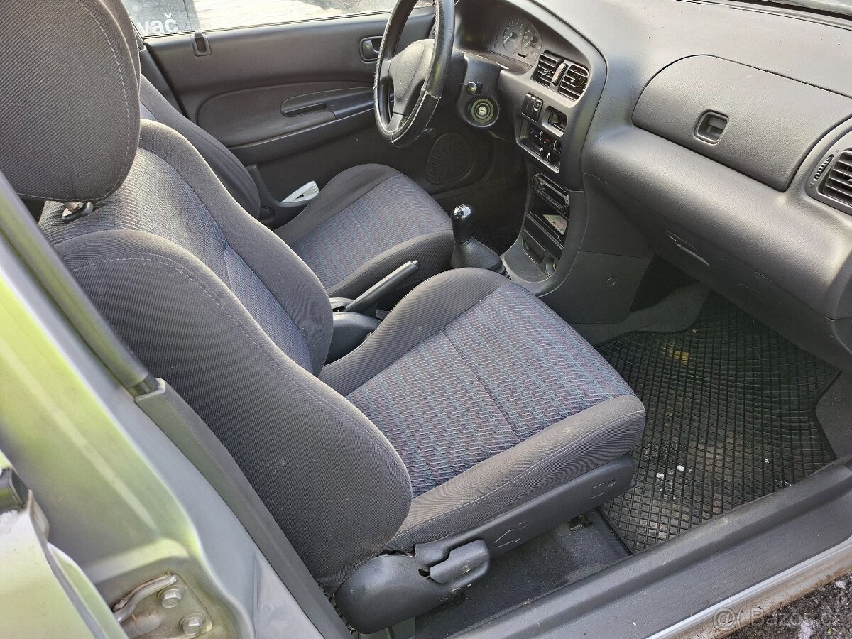 Mazda 323 1.3 54kw eko zaplaceno. - 5