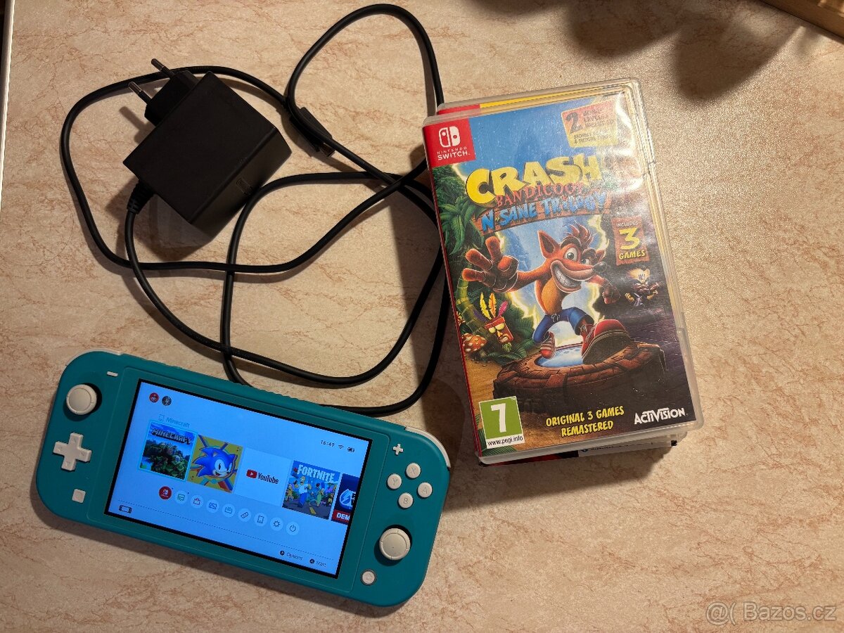Nintendo Switch Lite Turquoise (světle tyrkysová) + 4 hry - 5