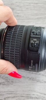 Nikon DX SWM VR Aspherical 28m/0.92ft průměr 52 - 5