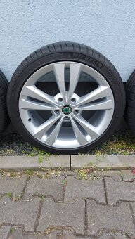 Alu kola 5x112 r18 Neptune originál Škoda Octavia II - 5