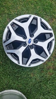Prodám sadu originálních alu disků - kol Subaru J17 x 7J - 5