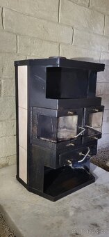 Prodam dvoukřídlá kamna +4metry kouřovodu o průměru 150mm - 5