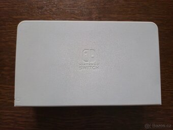 NINTENDO SWITCH OLED (bílá verze) + 4 HRY A CESTOVNÍ OBAL - 5