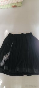 Čtyři dámské sukně vel. 38 - 5