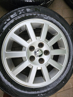 ALU kola letní Škoda 5x100 Fabia III Rapid R15 - 5