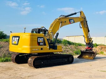 Pásový bagr Caterpillar 323 - 5