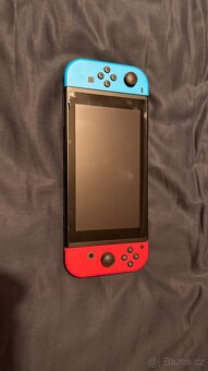 Nintendo Switch + Zelda Breath of the Wild - 5